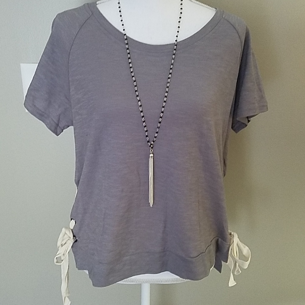 Adorable woman's side tie tee